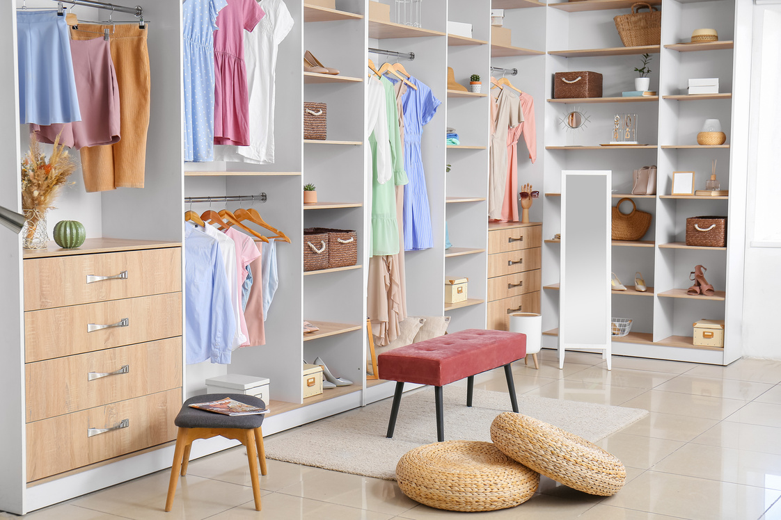 Interior of Walk-in Closet with Stylish Clothes